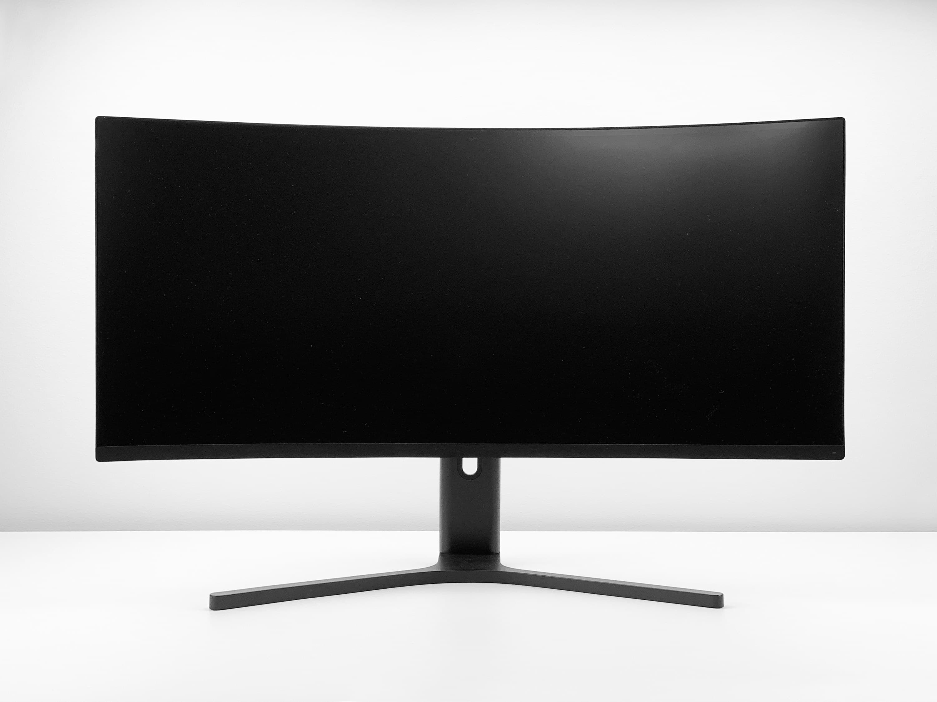 Curved ultrawide monitor on a minimalist stand